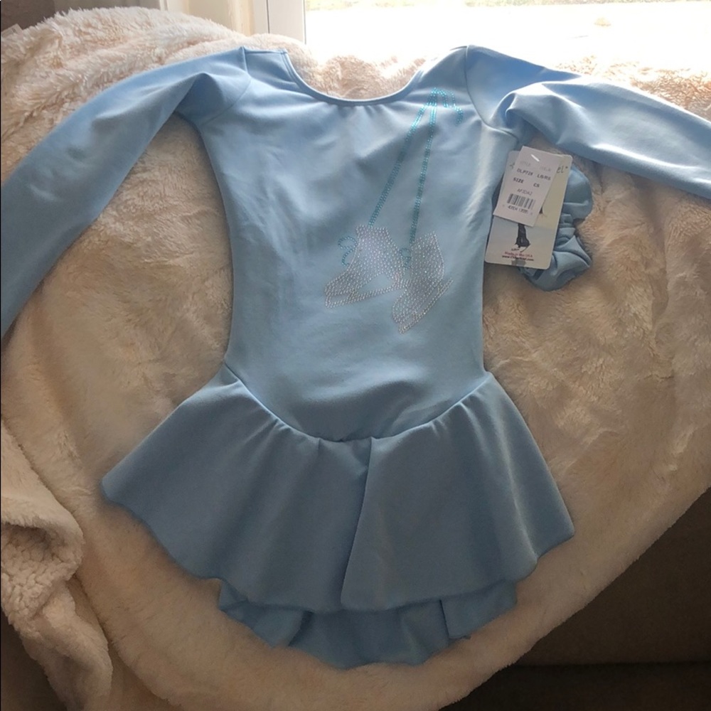 Children’s small figure skating dress never worn